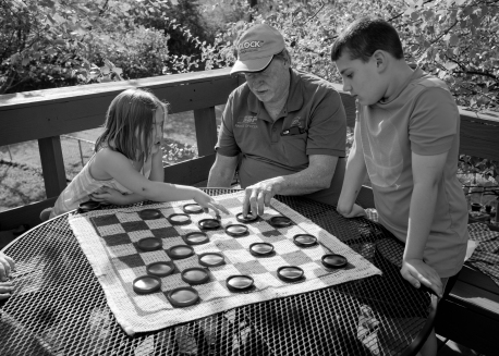 Pop picked up a checkers set at a yardsale. They played for hours...